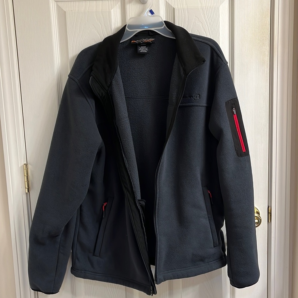Men’s fleece jacket. Gray with black accents. MED but runs big. VGUC
